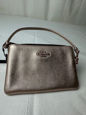 Coach Metallic Rose Gold Wristlet with Top Handle